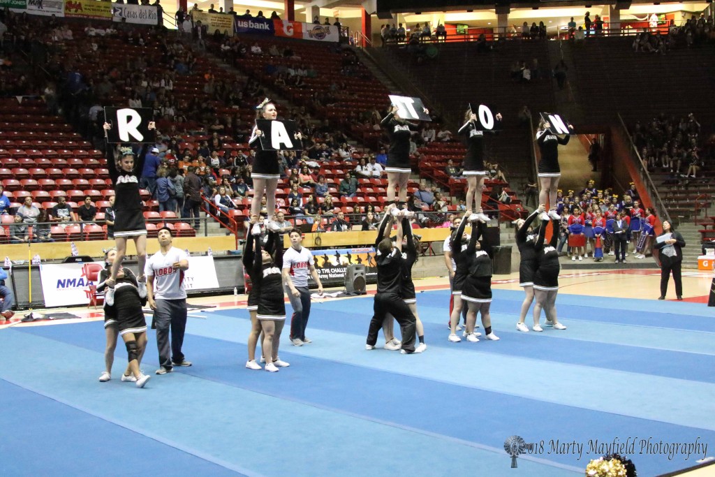Spelling out Raton, another one of the stunts the RHS Cheer team performed Saturday morning in The Pit during the State Spirit competition 