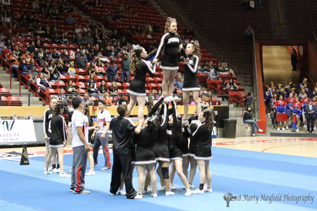The RHS Cheer Squad prepares for their finale as their 2 minute routine comes to an end.