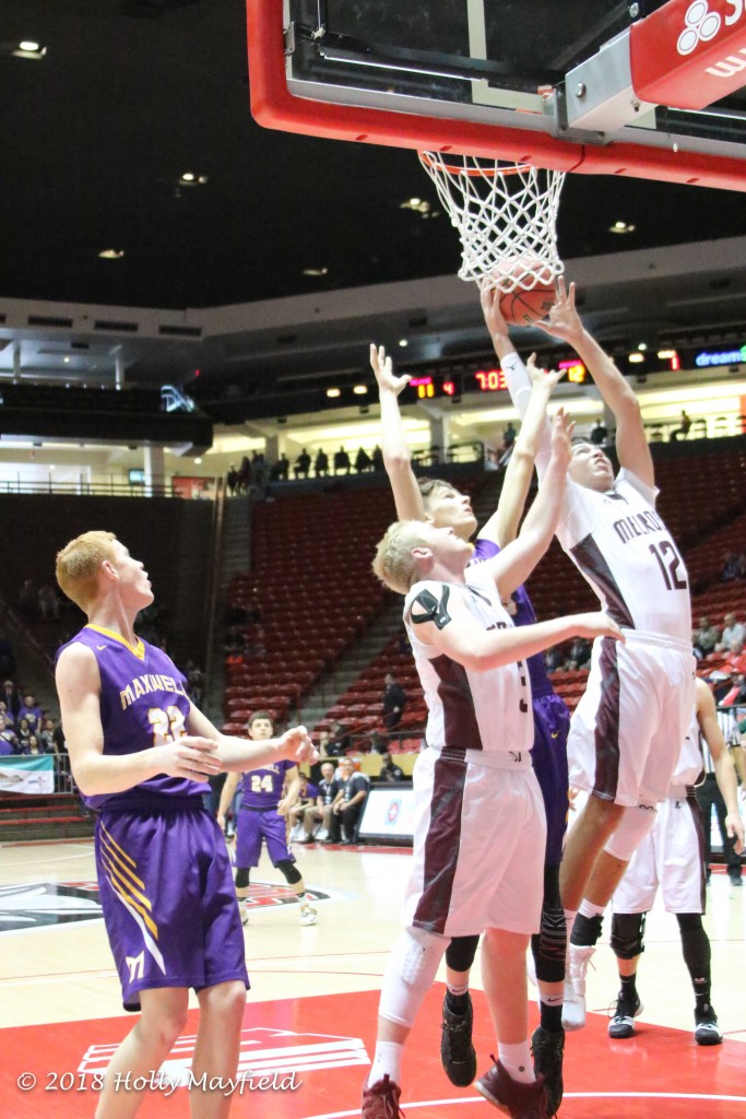 Up the big boys go for the rebound as Jordan Jasso and Kolton Riggs compete for the ball. 