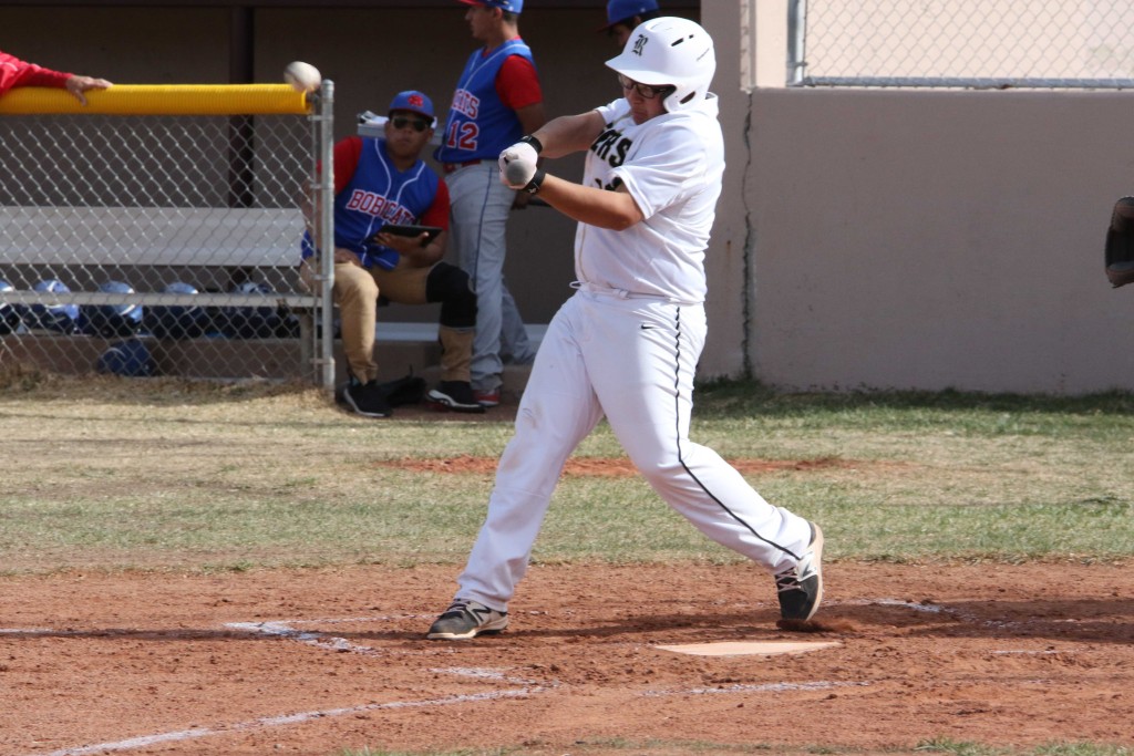 Jaden Romero sends the ball sailing and turns it into a triple base hit Tuesday afternoon against McCurdy. 