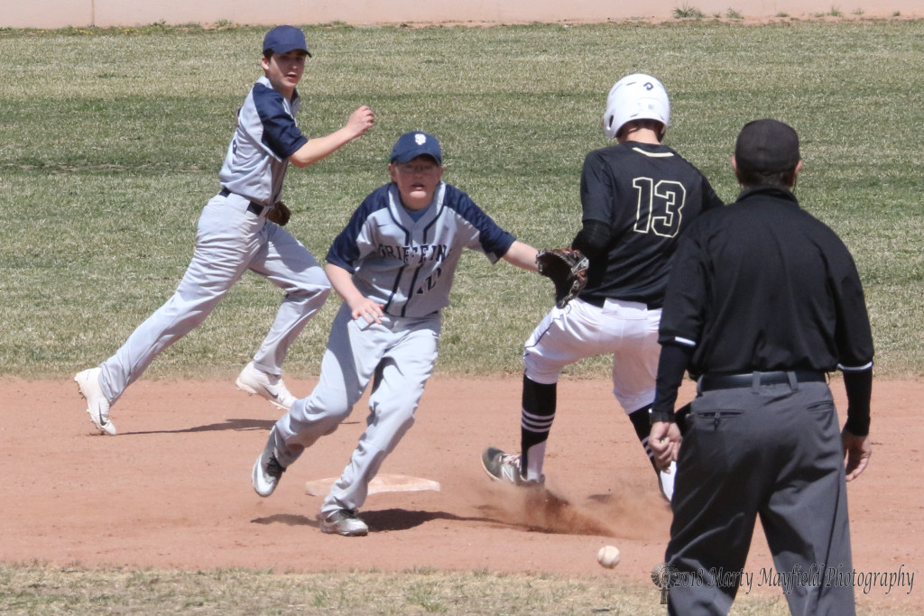 Matthew Quartieri steal second base as the ball goes wide on the throw from catcher Kate Schilling in game two of the double header with Santa Fe Prep Saturday afternoon.