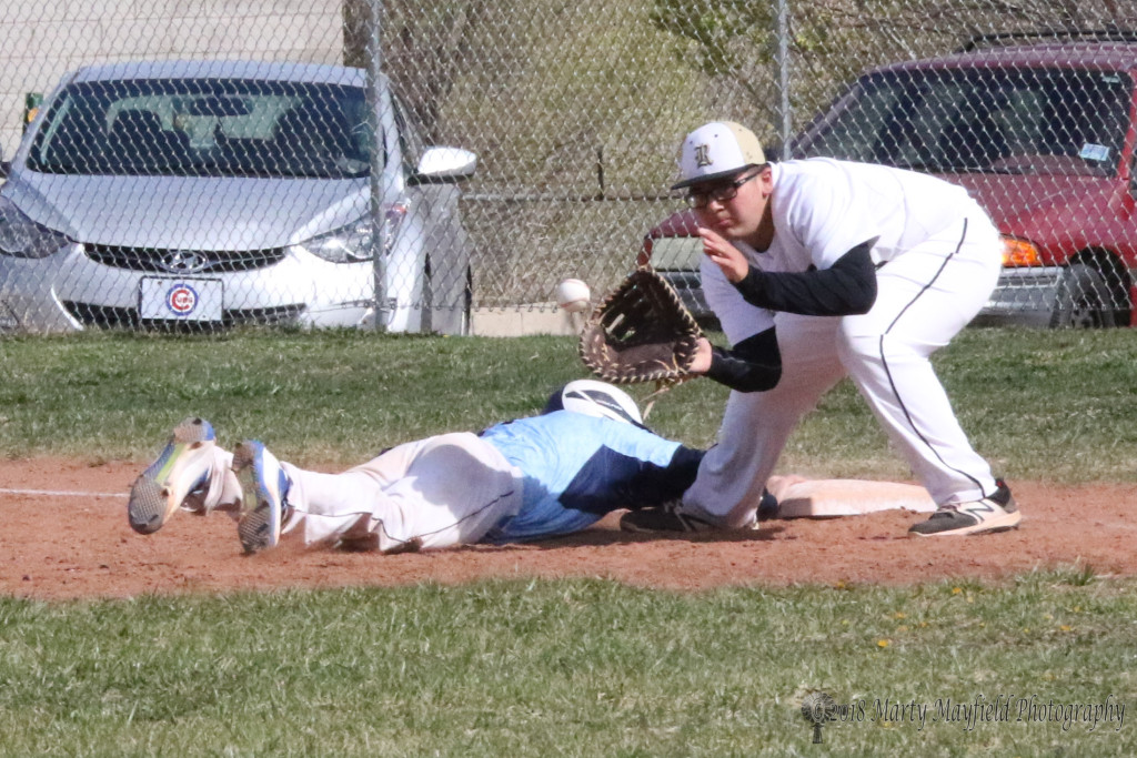 One of many throws to first base Jaydon Romero to try to catch the base runner off guard and keep him from stealing second during the game with Trinidad Tuesday afternoon.