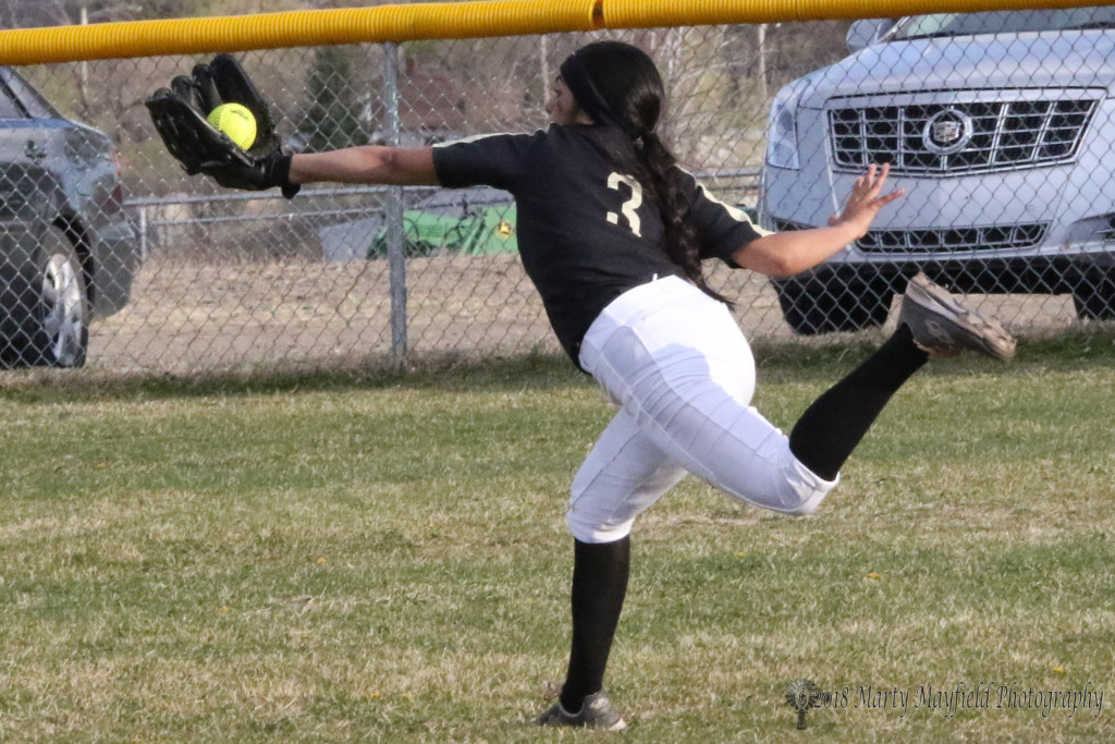 Anna Acosta makes the catch but as she goes to to turn her pit around and make the throw she looses the ball and an out turns into a double for Taos. 