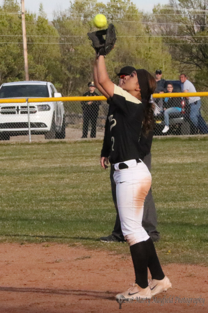 Natausha Ortega makes the catch on the high fly ball in game two of the double header with Taos Tuesday afternoon. 