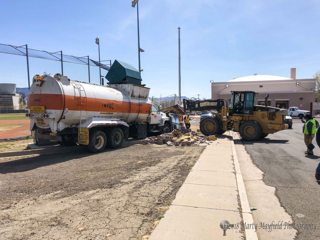 A Raton City Trash Truck barely missed the high voltage transformer that provides electricity to the lights at Gabrielle Field however the announcers booth was not as fortunate as the trash truck totally destroyed it.