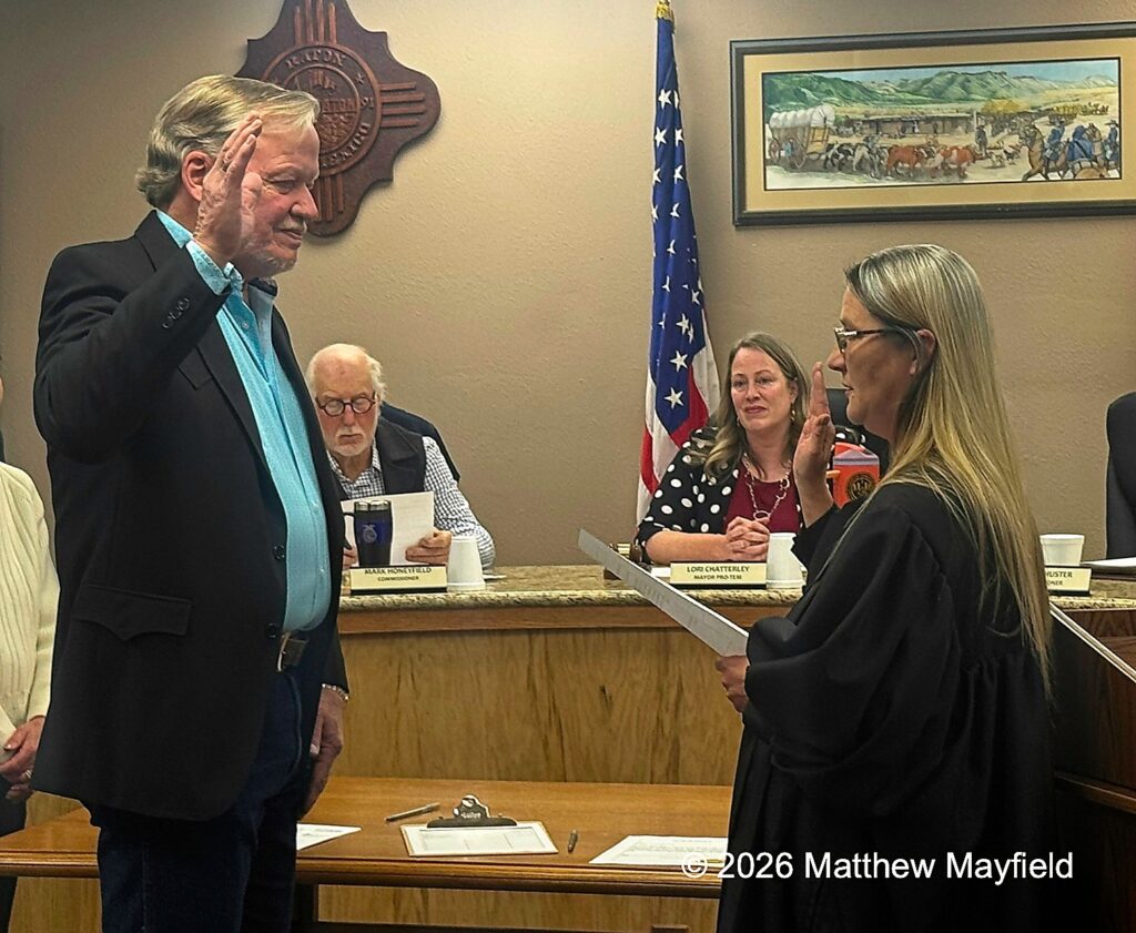 Dan Campbell is sworn in as Raton City Commissioner by Municipal Judge Christine Piancino.Looking on are newl Raton Mayor Pro=Tem Mark Honeyfield and new Raton Mayor Lori Chatterley